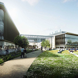 A group of people walking outside of a building.