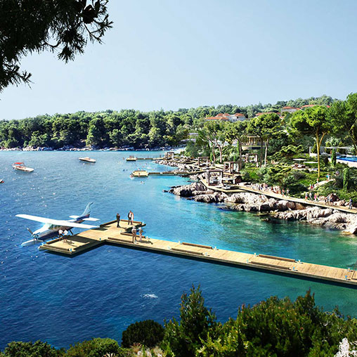 A body of water with boats and buildings around it.