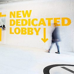 A person walking on a sidewalk.