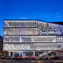 A large building with glass windows.