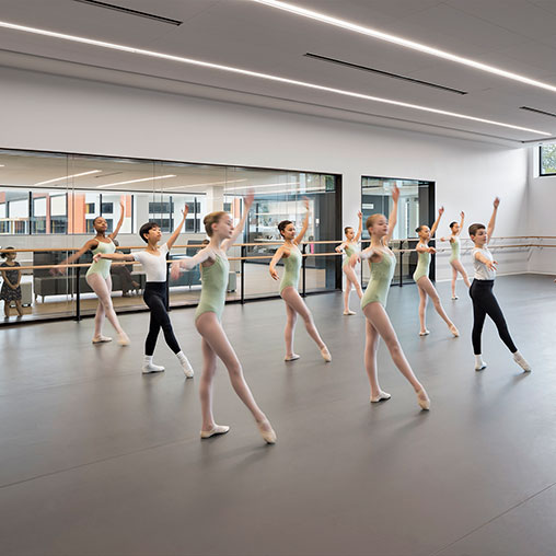 A group of people dancing.