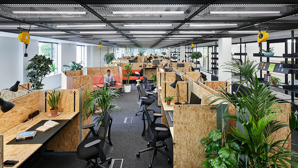 An office with a few people.