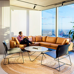 A person sitting on a couch.