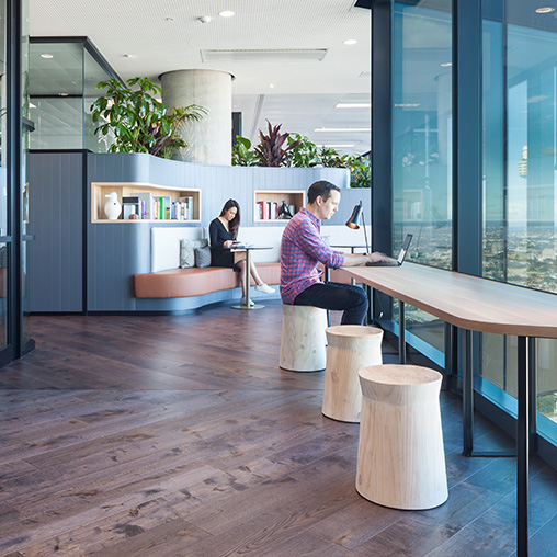 A few people in an office.