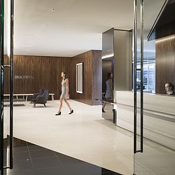 A person walking in a hallway.