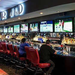 People sitting at a bar.