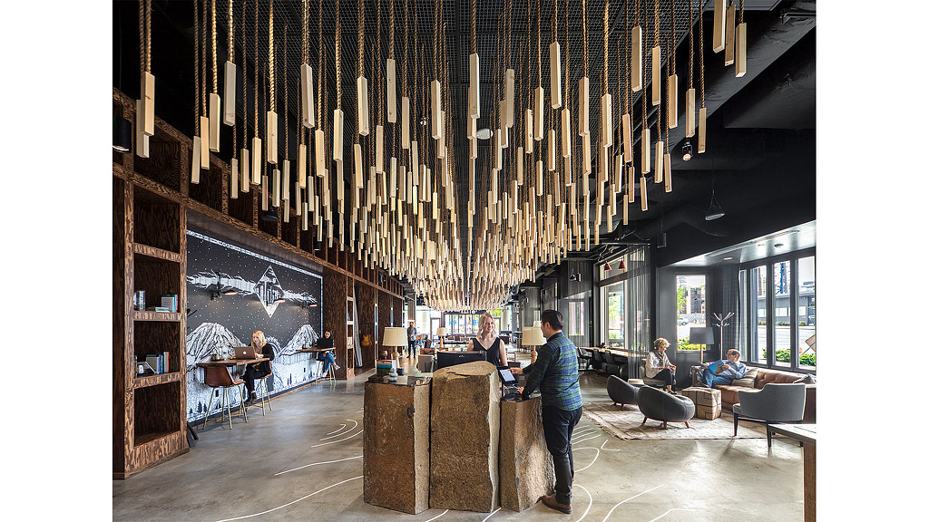 A group of people in a library.