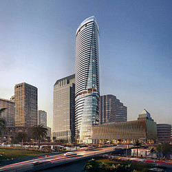 A tall building with a road in front of it.