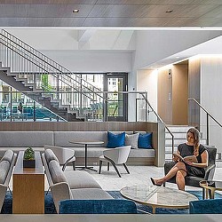 A woman sitting in a chair.