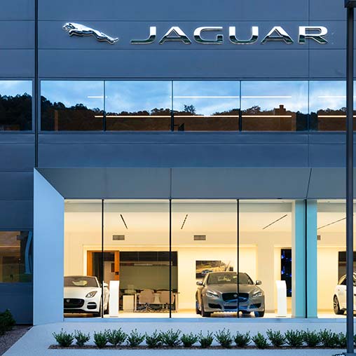 A building with cars parked outside.