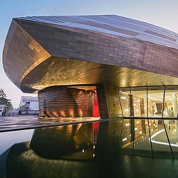 A building with a glass front.