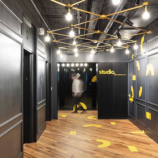 A person walking through a building.