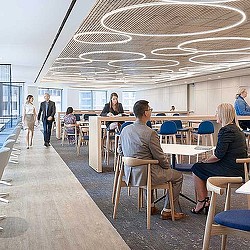 People sitting at tables in a room.