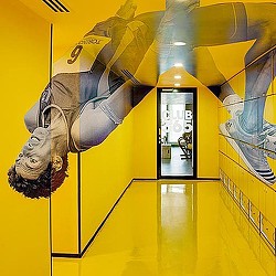 A wall with art on it.