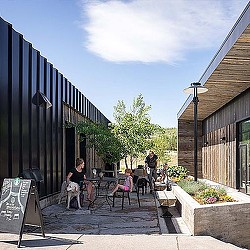 People sitting outside a building.