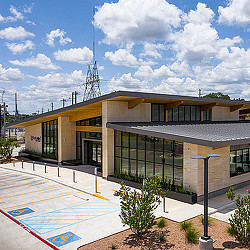 A building with a glass front.