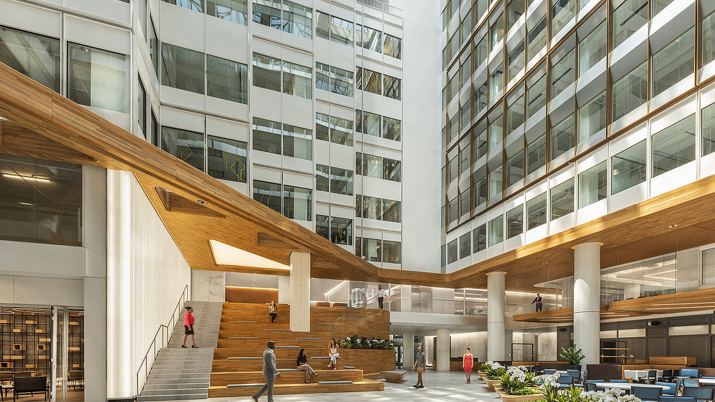 A building with stairs and people.