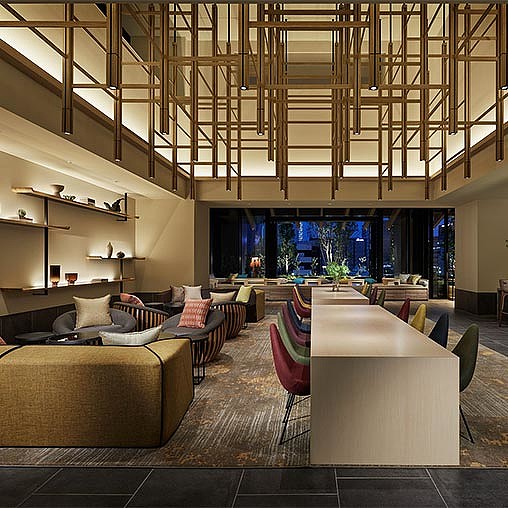 A room with couches and chairs.