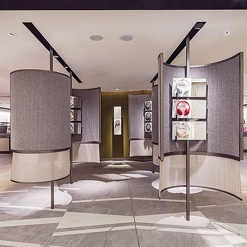 A room with a glass door and a glass wall with a glass window.