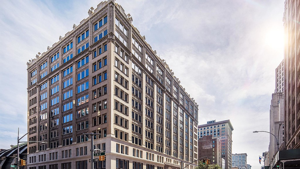 A tall building with many windows.