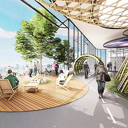 A large glass building with people walking around.