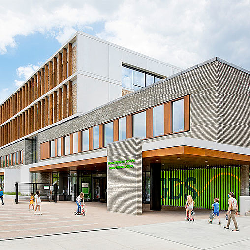 A building with people walking around.