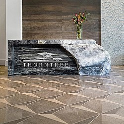 A stone coffin with a flower in it.