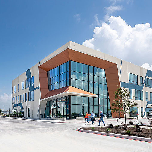 A building with people walking around.