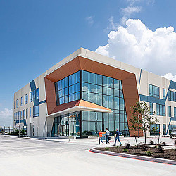A building with people walking around.