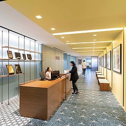 A few people in an office.