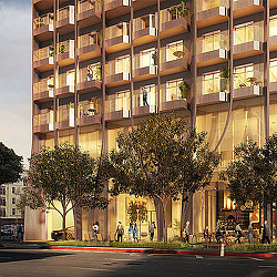 A building with trees and people in front of it.