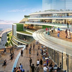 A group of people walking around a building.