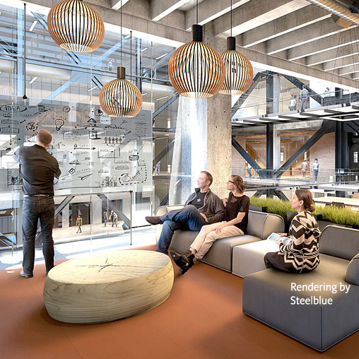 A group of people sitting on a couch in a building.