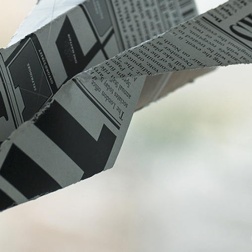A close-up of a newspaper.