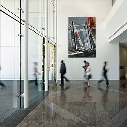 People walking in a hallway.