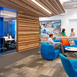 A group of people sitting in chairs.