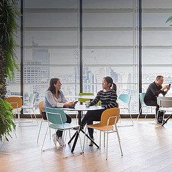 A group of people sitting around a table.