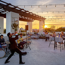 A group of people playing instruments.