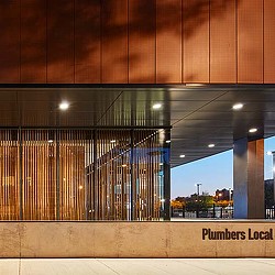 A building with a large glass wall.