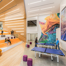 A room with a table and chairs.