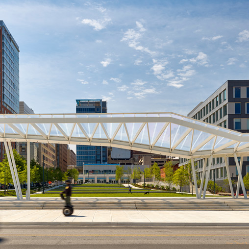 A large building with a walkway.