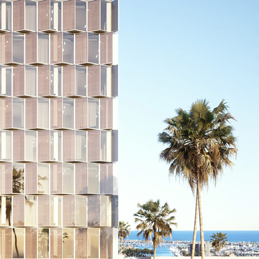 A tall building with palm trees.