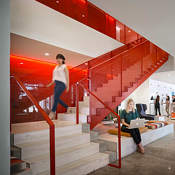 A man sitting on a staircase.