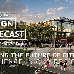 A group of people walking on a sidewalk next to a building.