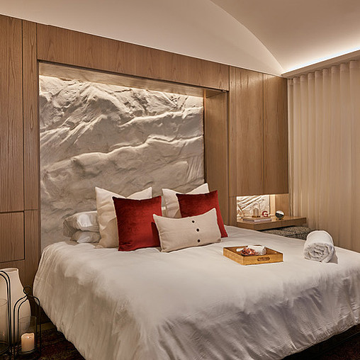 A bed with pillows.