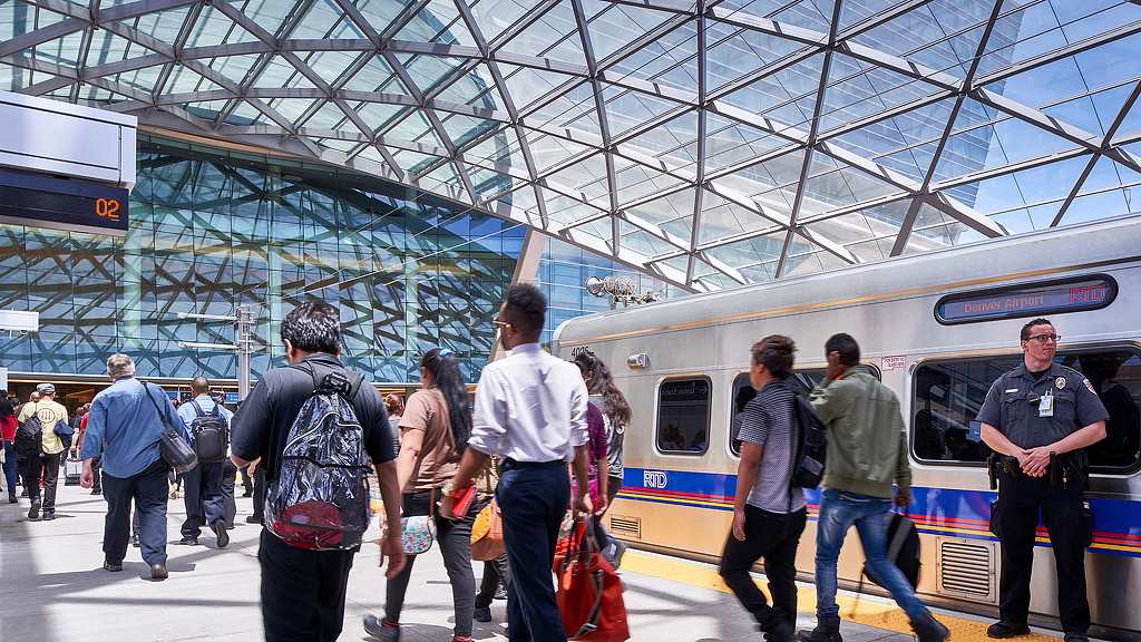 People walking near a train.