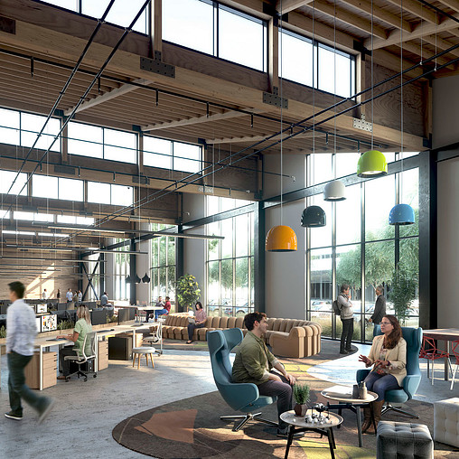 People sitting in chairs in a large building.