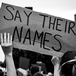 A person holding a sign.