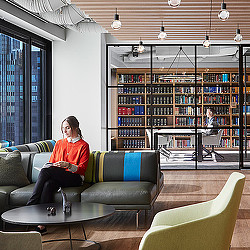 A person sitting on a couch.