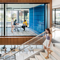 A person walking up a flight of stairs.